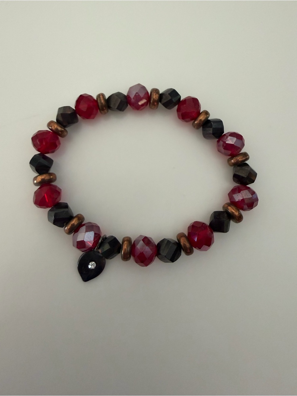 Red and Black Faceted Bead Stretch Bracelet with Copper Accents